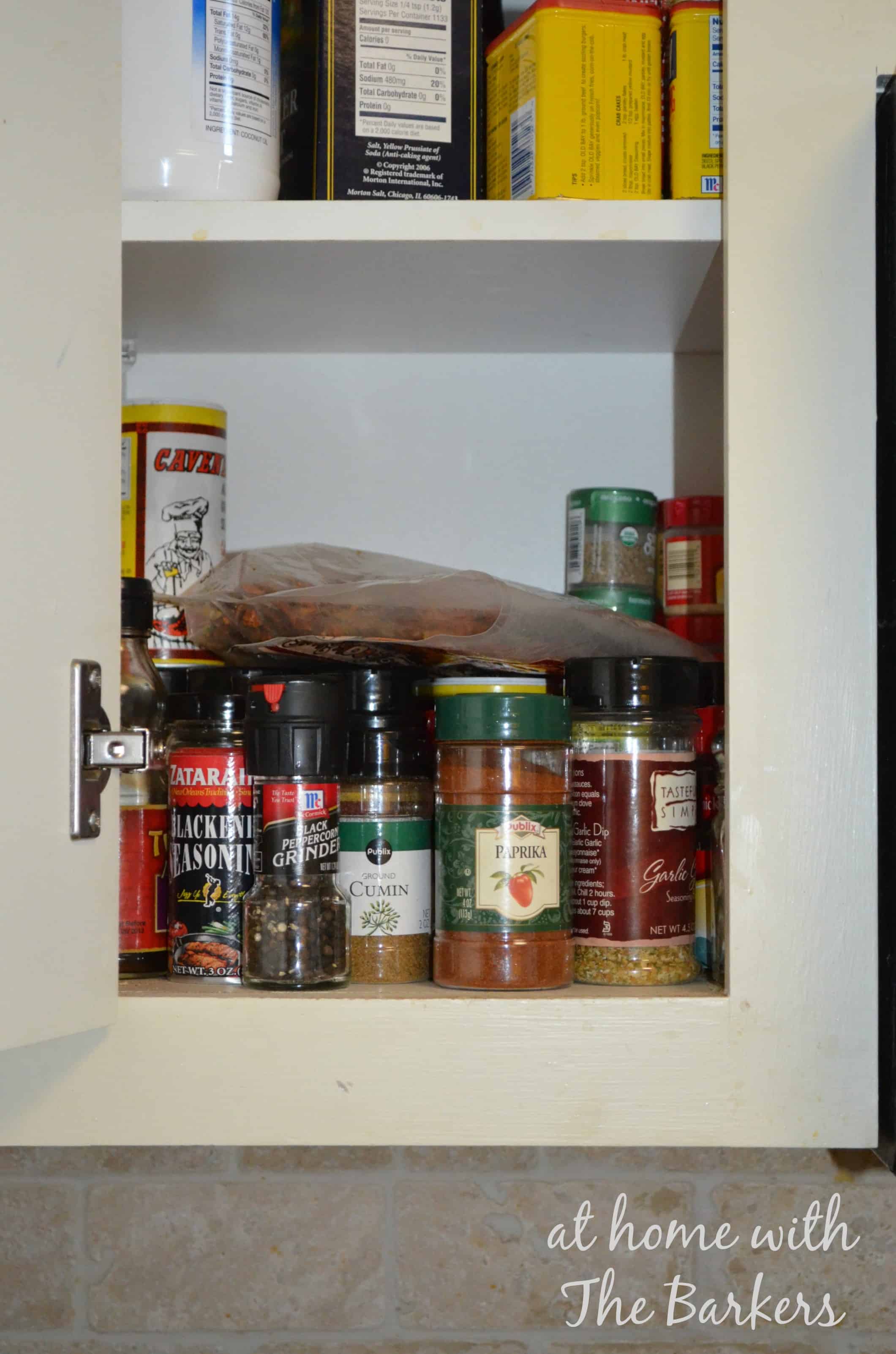 https://athomewiththebarkers.com/spice-cabinet-organizing/spice-cabinet-before/