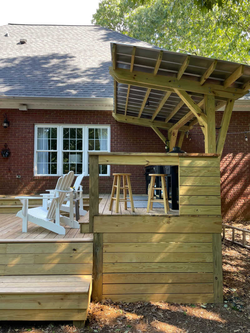 deck makeover after of outdoor kitchen