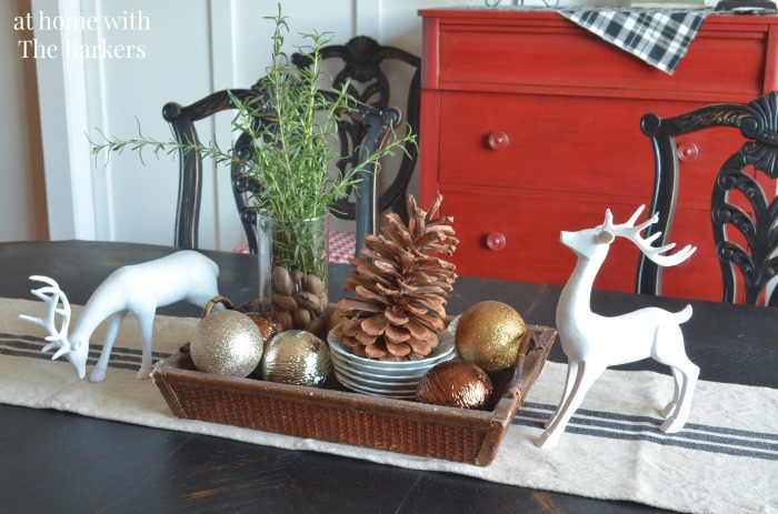 Dining Room Christmas Decor using Deer, metallics and pinecones