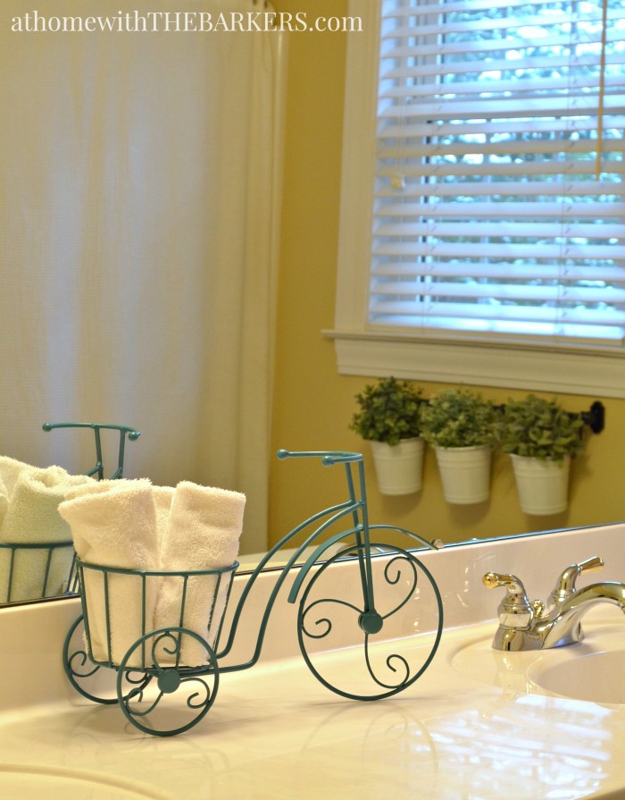 Thrift Store Iron Plant Stand Repurpose as bathroom accessory