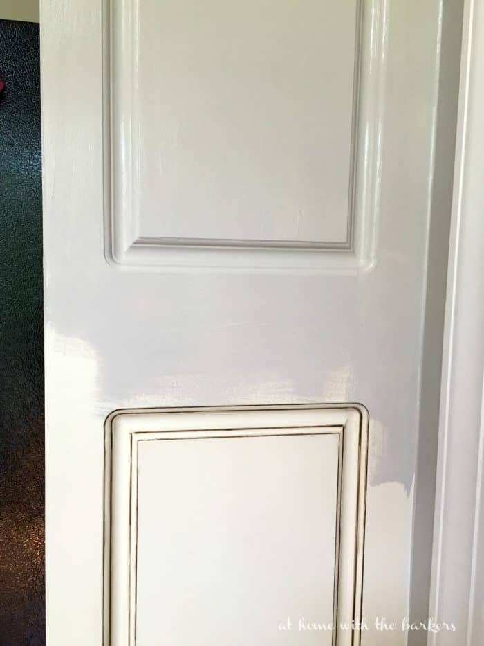 Painting Kitchen cabinets showing before and after progress