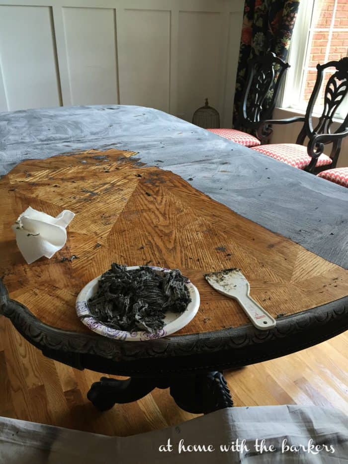 Stripping Paint from Dining Room Table using plastic scraper