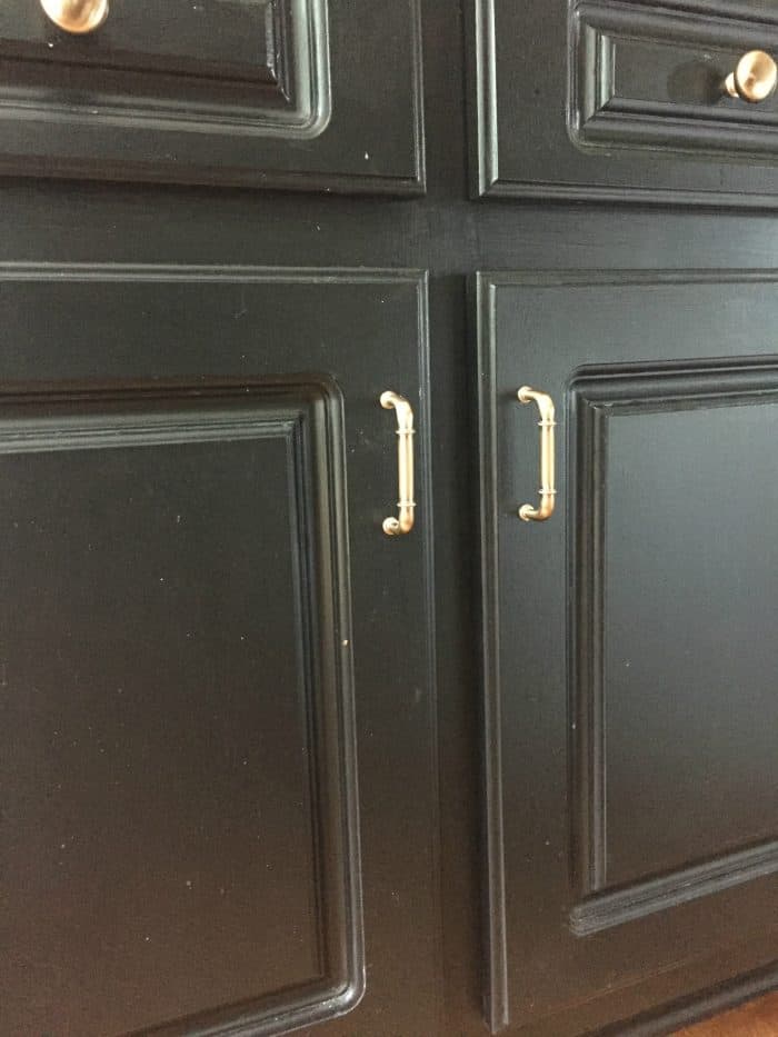 https://athomewiththebarkers.com/wp-content/uploads/2016/08/Black-Painted-Cabinets-One-year-later-700x933.jpg