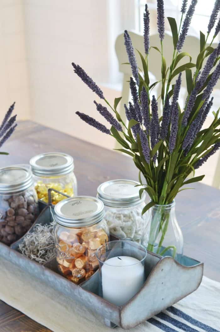 Galvanized farmhouse style tray filled with ball jars