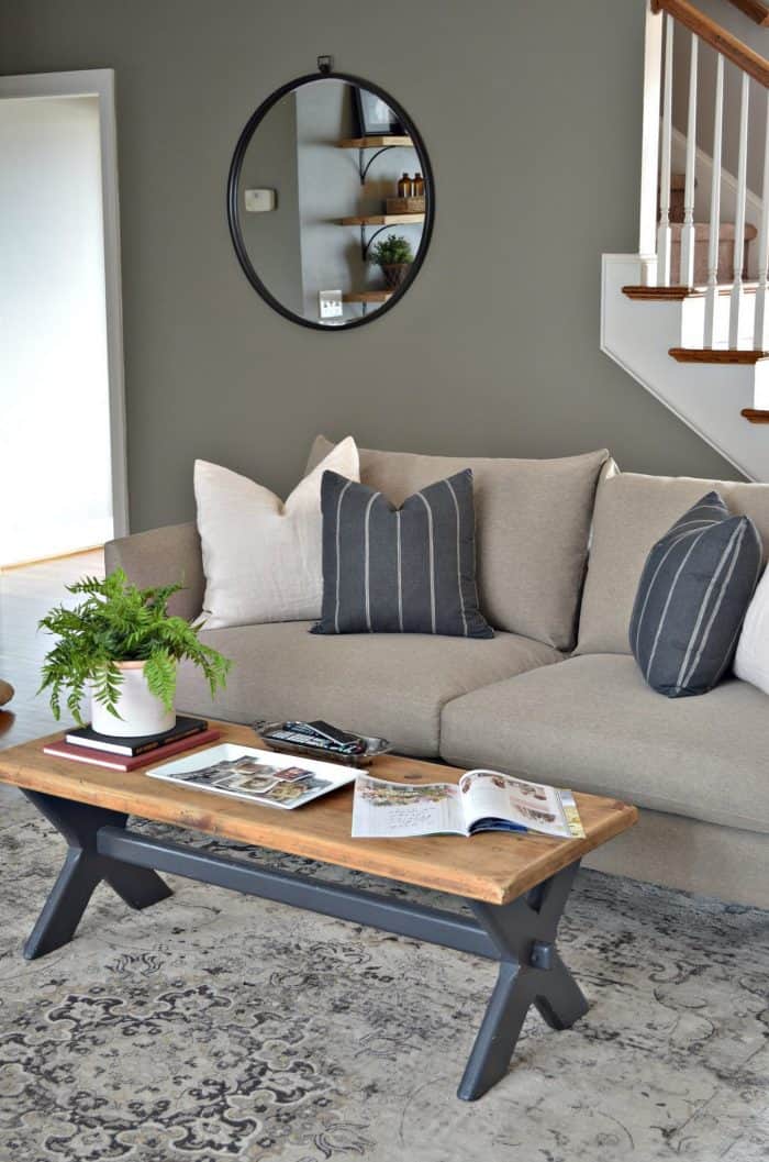 Living room makeover using modern sofa and vintage coffee table.