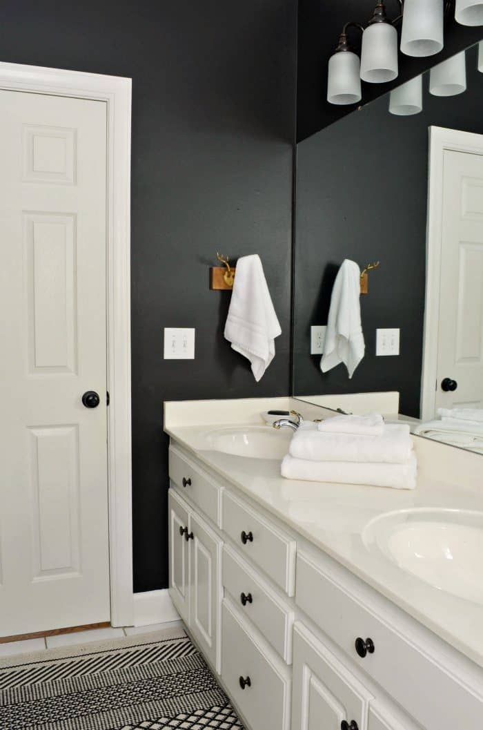 Bathroom makeover painted black walls