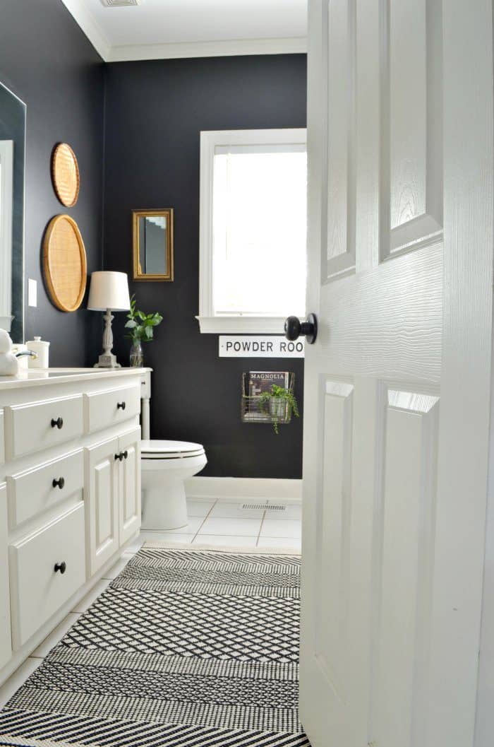 Bathroom makeover painted black walls