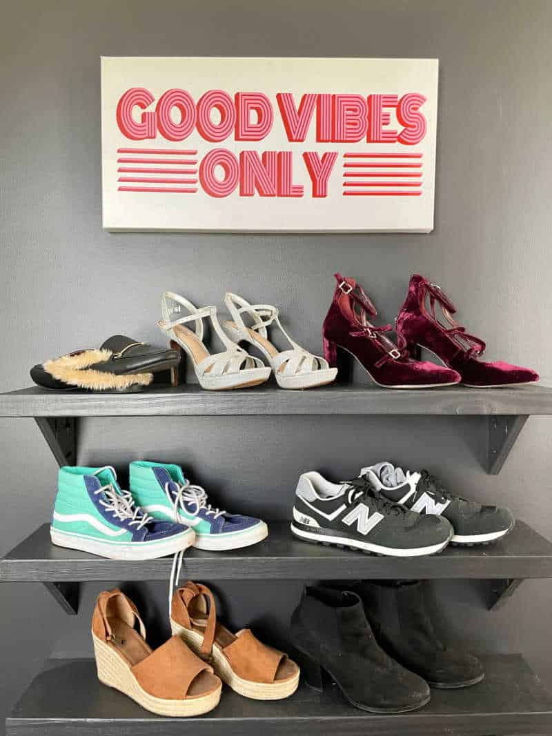 organized shoe shelf in closet