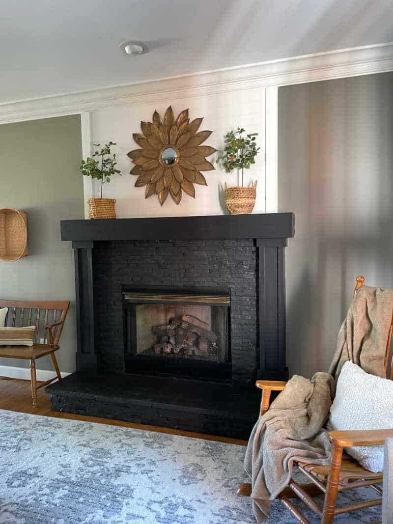 black magic by sherwin williams painted fireplace stone