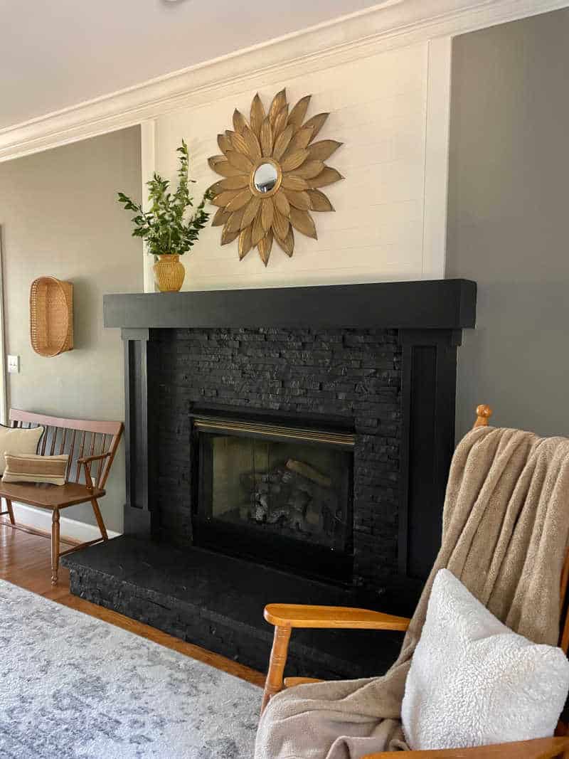 stone tile fireplace in dining room