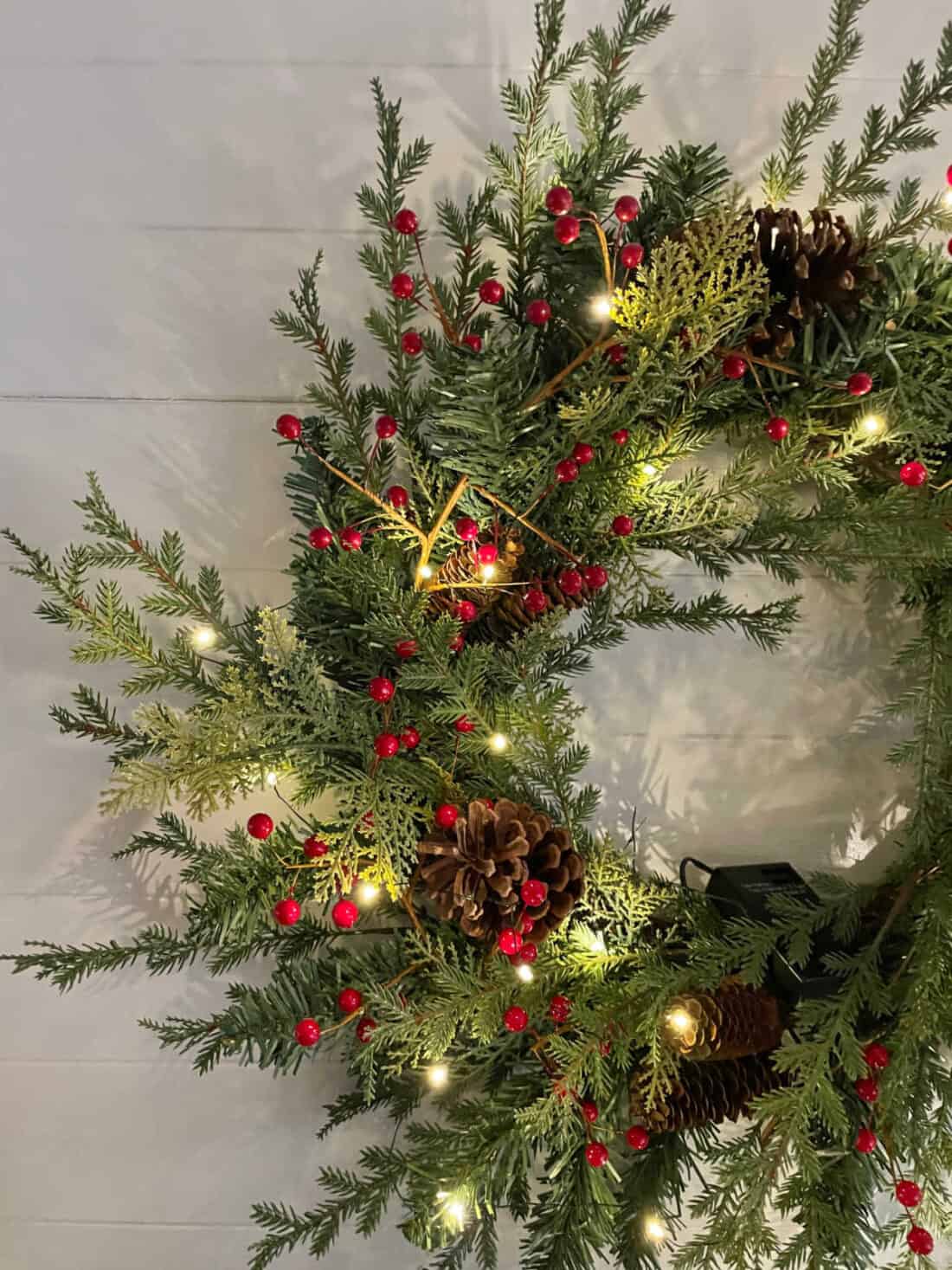 2021 Christmas Night Tour mantel wreath at night