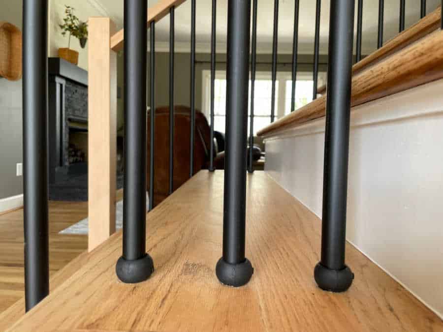 closeup of iron balusters and shoes