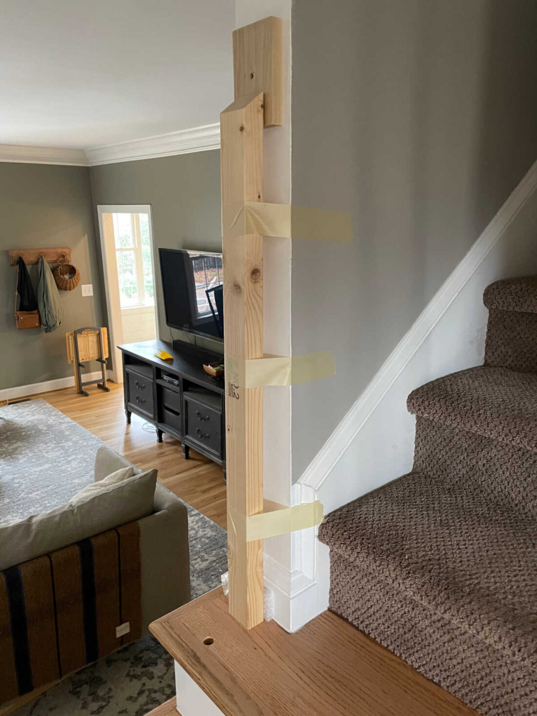 Staircase Makeover hardrail installation trick with temporary board