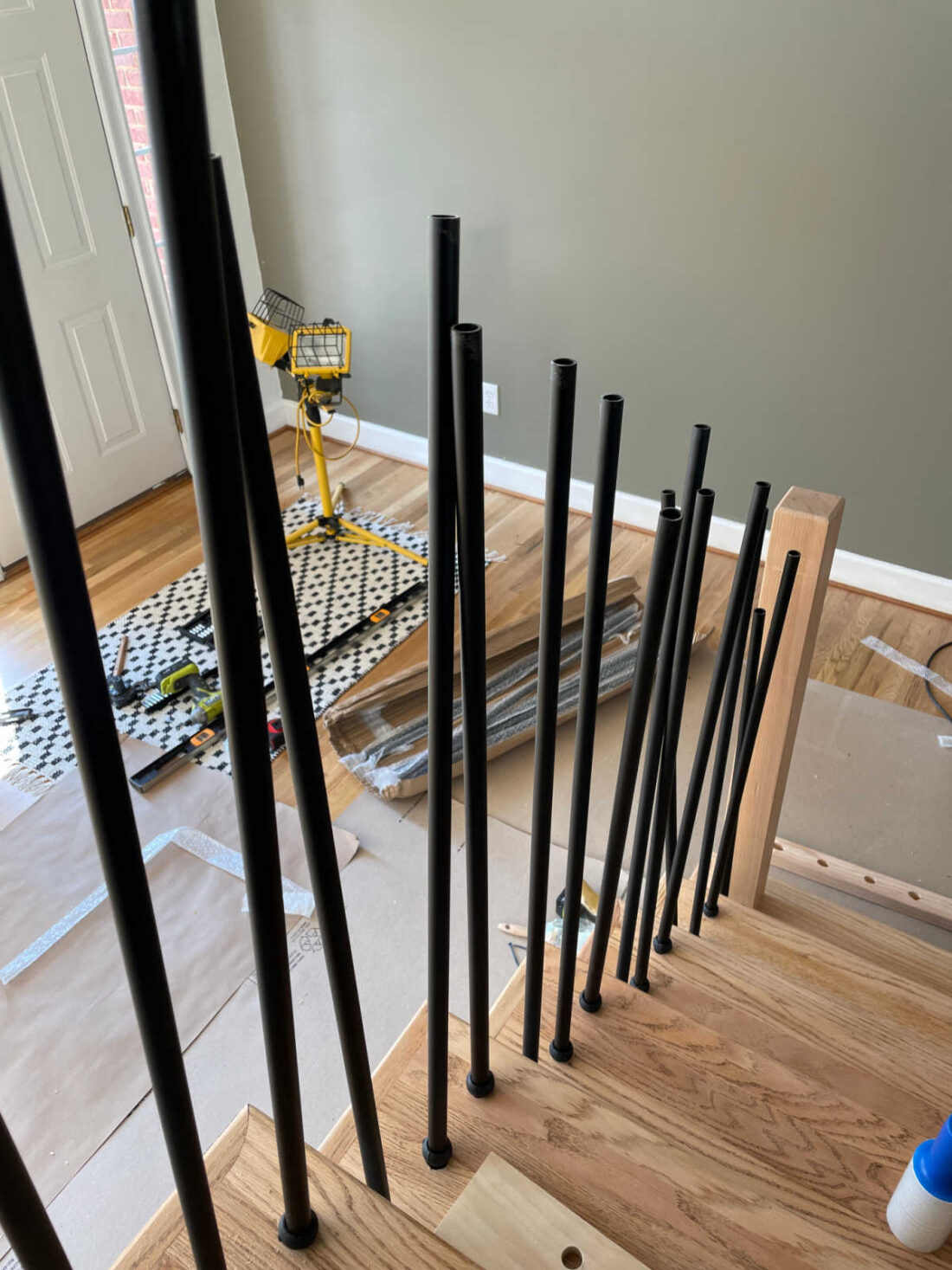 installing iron balusters into bottom tread without handrail