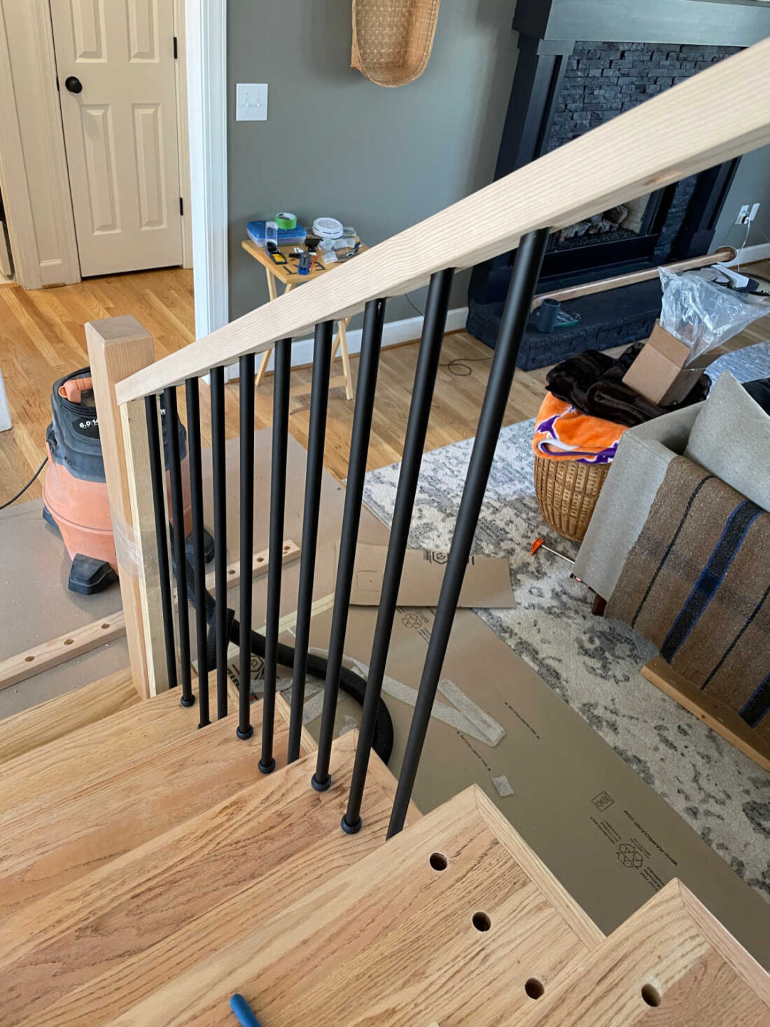 Staircase Makeover wrought iron balusters install view from top