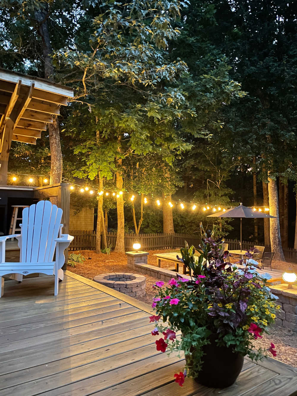 deck view of outdoor string lights at night