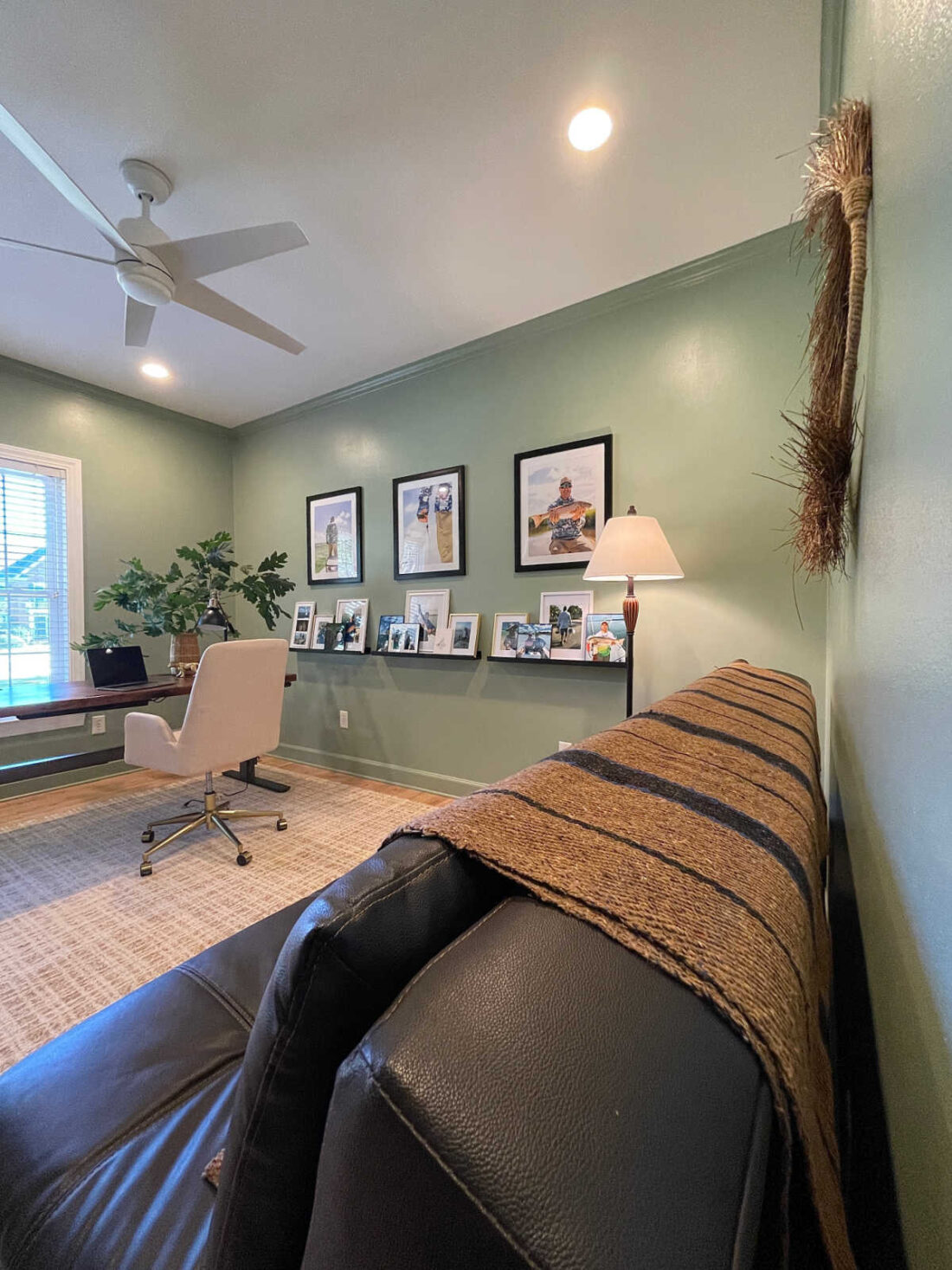 home office gallery wall and futon seating