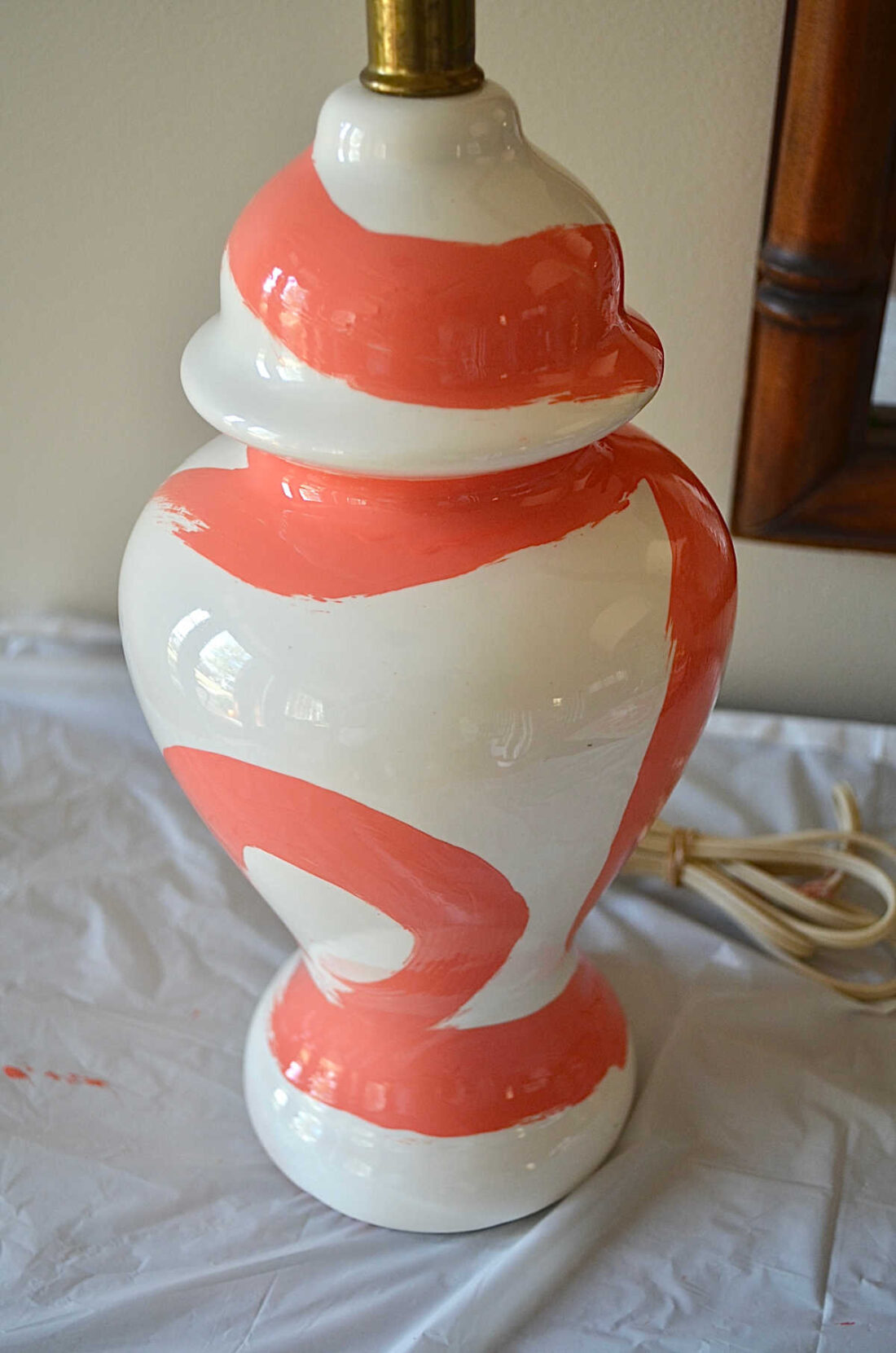 white hand painted brushstroke lamp in a coral color