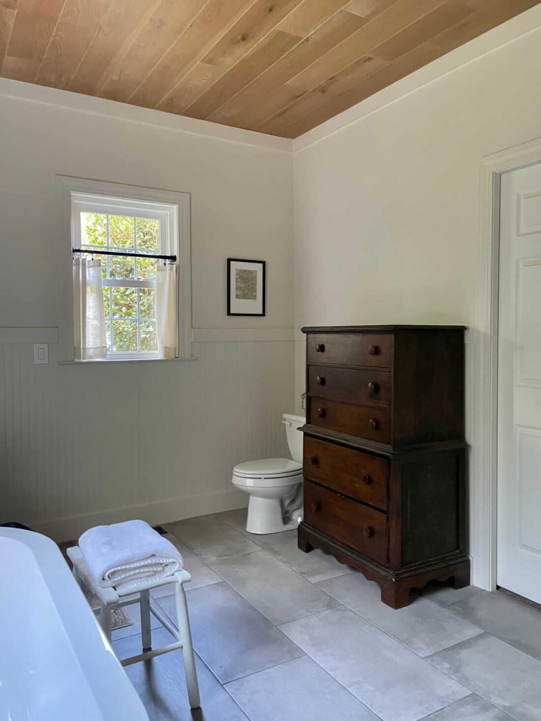 vintage wood dresser storage in bathroom