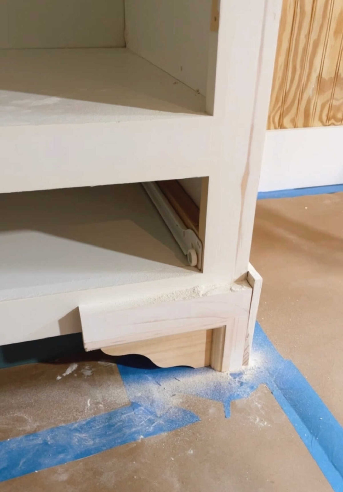 wood detail added to front bottom of vanity by using a wood shelf bracket