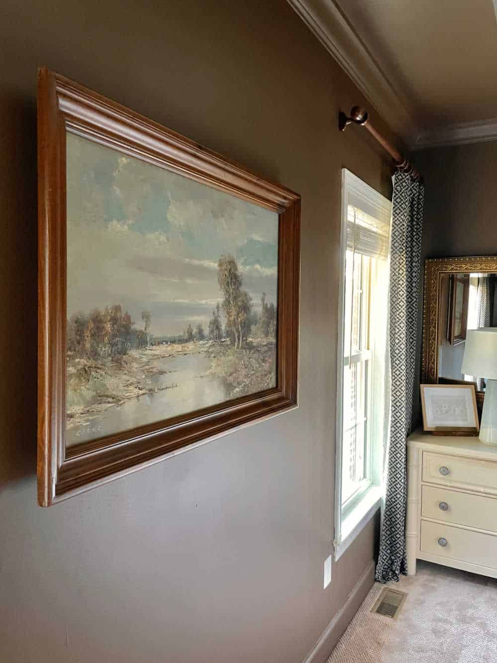 Master Bedroom Vintage art canvas on dark brown painted walls