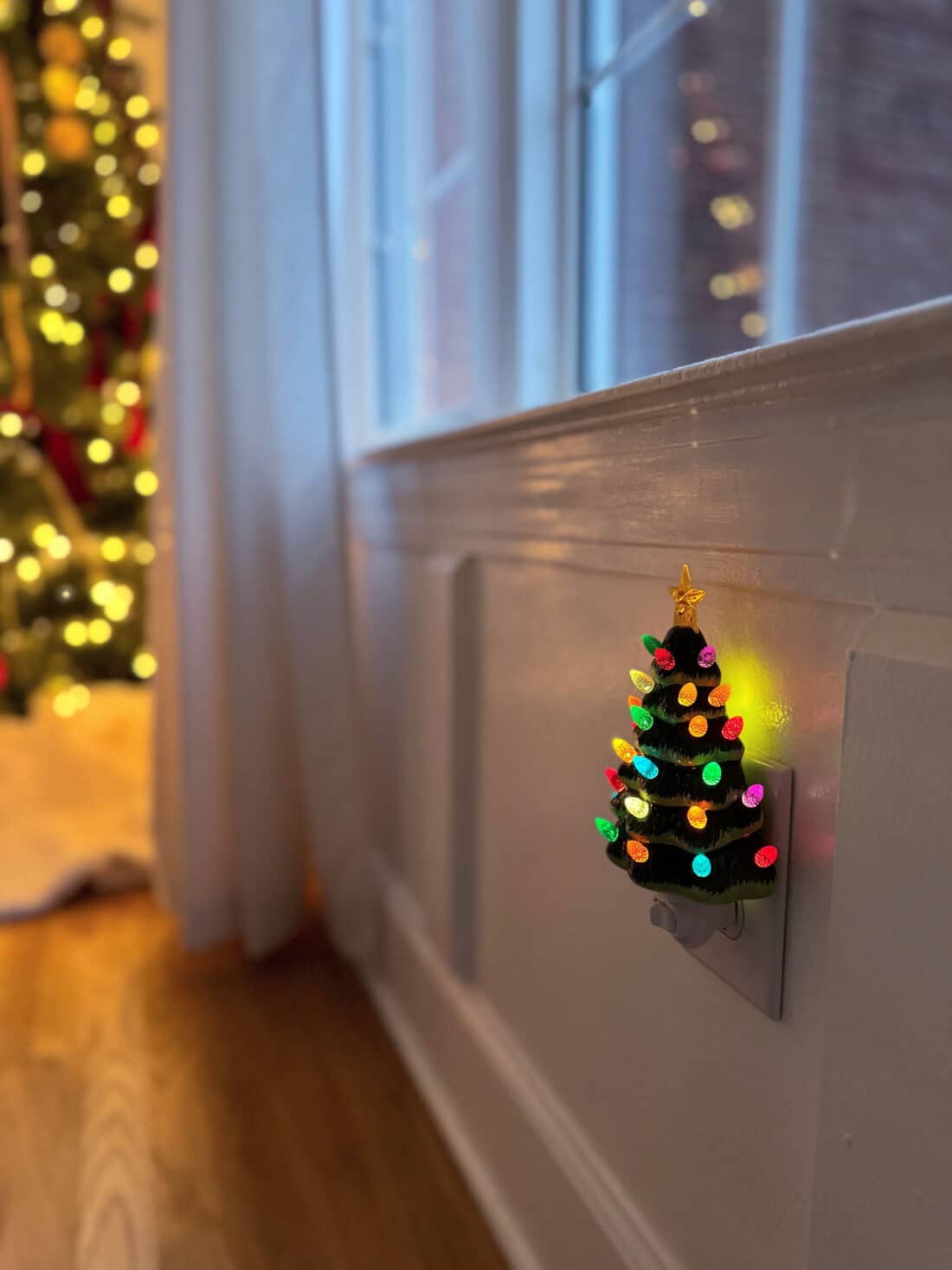 Christmas tree night light plugged into wall