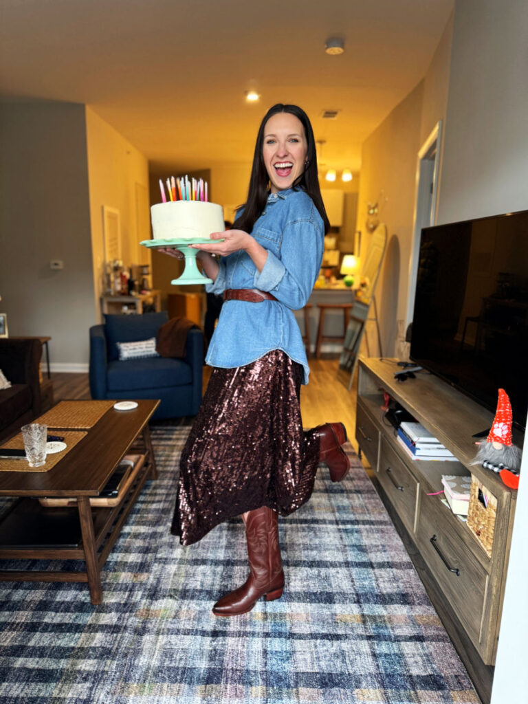 Sarah Beth holding cake for birthday on Martha Stewart Jadeite cake plate