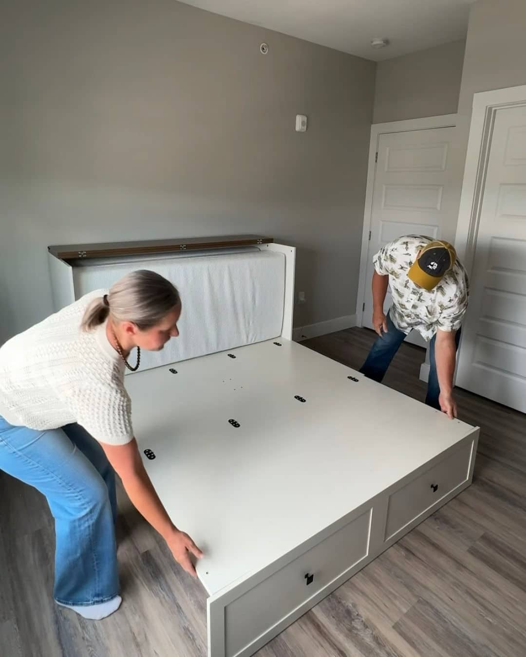 Ray and Sonya Barker opening the murphy bed